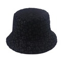 Detail view of the black leopard print texture on a warm reversible bucket hat - 58cm / Black