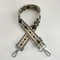 Detail view of ethnic jacquard shoulder strap with silver hooks and geometric patterns - No.2 Green Coffee + Silver Buckle