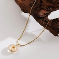 Gold titanium steel necklace featuring a circular dried white flower pendant - |round-light Yellow