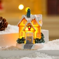 Detail of miniature glowing Christmas house with warm LED light and white snow texture - Style 302-1 F (Snow House)