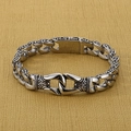 Detailed close-up of retro silver totem engraved links on a heavy Cuban steel bracelet - Steel Color (KB15402-D)