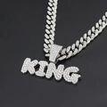 Macro shot of silver hip hop Cuban chain necklace featuring iced-out KING letter pendant - Silver Pendant (Letter KING) + Iced Out Cuban Chain 60CM