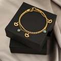 Detail of double-layer gold chain bracelet with blue lapis beads and fan charms - Fan-shaped Blue Bead Double Layer Style (SL-53)