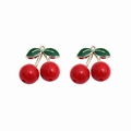 Detailed view of red cherry enamel charms with green leaves and gold hooks for DIY jewelry - Red