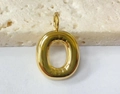 Detailed view of a golden bubble letter O pendant crafted from polished stainless steel - Letter-O / Gold