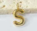 Polished golden stainless steel bubble letter S pendant on a natural stone base - Letter-S / Steel
