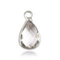 Macro shot of a teardrop-shaped glass birthstone pendant in a silver metal frame - Silver - April