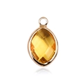 Elegant gold oval pendant featuring a fine-cut yellow crystal with a clear reflection - Gold - November