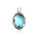 Macro view of blue faceted marquise glass pendant with a gold plated bezel setting - Gold - March