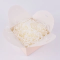 Macro view of white shredded paper filler inside a small cardboard gift box with wavy edges - 20g per Pack / Beige