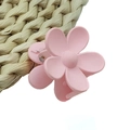 Matte pink flower hair claw clip with five petals shown on a rustic straw background - Small Flower Style / Pink
