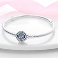 Detailed view of silver snake chain bracelet featuring a blue Evil Eye charm with zircons - Evil Eye Charm Bracelet (CMB084)