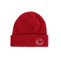Winter beanie in dark red knit featuring a white embroidered smiley face on the cuff - Burgundy