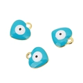 Detailed macro view of three gold-plated heart charms with blue enamel evil eye pattern - Gold Base Blue