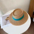 Detailed top view of a flat top straw sun hat with a blue ribbon on a white table - M (56-58cm) / Khaki Fedora-Lake Blue Ribbon