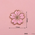Detailed view of 17mm pink enamel sakura flower alloy accessory with gold metal edges - D935 Pink Cherry Blossom