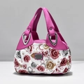 Pink and white rose floral print handbag with silver hardware and a sleek metal tag - Rose Red Rose