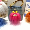 Pink furry monster bag charm with big eyes and gold hook on a denim tote bag - Single Piece / Rose Red