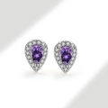 Detailed close-up of pear-shaped purple zircon earrings with white pave setting - 925 Silver / Amethyst Purple (February)
