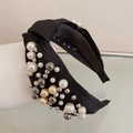 Detailed side view of black knotted headband with mixed faux pearls and metallic beads - Black
