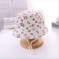 Kids cream floral bucket hat with pink flower patterns and adjustable white chin strap - 22 Beige Floral Print / 54cm