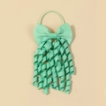 Detail of mint green grosgrain ribbon hair tie with corkscrew tassels for girls - Green