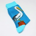 Detail of blue mid-calf socks featuring a pixelated pelican motif and contrast heel - One Size / Pelican Pattern (A165)