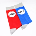 Detailed knit texture of red and blue cotton socks featuring COLD lettering - COLD Letters