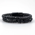 Detailed view of the black braided leather layers and polished magnetic metal clasp - Black