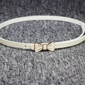 Sweet white patent leather skinny belt with a gold bow buckle for women's dresses - White