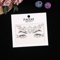 Détail de strass visage irisés aux formes variées sur emballage en carton - 165*155mm / Blanc