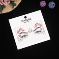 Close-up of exotic red rhinestone facial jewels with iridescent glitter for eye makeup - AB Red