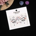 Detailed view of colorful acrylic face gems and diamond stickers on white card - Colorful