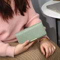 Pale green long quilted wallet for women featuring elegant gold trim and large capacity - Green