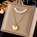 Double-layered gold necklace with heart pendant and pearls on a beige jewelry box - Double Layer Heart Pearl Style (N1916)