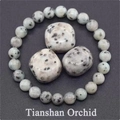 Macro detail of Tianshan Orchid natural stone beaded bracelet with matching raw mineral stones - Natural Stone