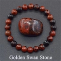 Detailed view of polished Golden Swan Stone beaded bracelet with a smooth texture - Golden Swan Stone