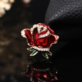 Exquisite red enamel rose brooch with white rhinestones and golden base on black background - 8328 Red