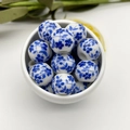 Macro shot of blue and white ceramic floral beads in a white bowl for DIY jewelry - 6mm (Hole 2.8mm) / Blue and White Floral