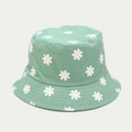 Detailed close-up of light green canvas bucket hat with white daisy floral patterns - M (56-58cm) / Grass Green