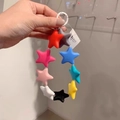 Portachiavi a stella in silicone colorato con perline vivaci per borse e cellulari - Anello 27mm 9 Stelle con Perline