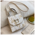 Cream white crossbody bag with golden butterfly prints and silver metallic bow buckle - Off White