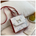 Contrast butterfly backpack in red and white with silver bow metal buckle detail - Red