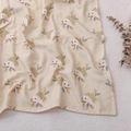 Newborn baby swaddle blanket featuring a cute hand-drawn hedgehog print in warm beige - Hedgehog & Leaves (S167)