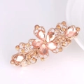 Eleganter goldener Blumen-Haarclip mit rosa Kristallen für stilvolle Damen - Champagner