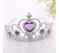 Detailed close-up of a silver princess crown featuring a central purple heart-shaped gemstone - Purple