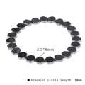 Detail view of 2.3*8mm hexagonal black hematite beads on a 19cm elastic bracelet - Hexagon 2.3*8mm