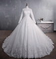 Elegant white high-neck long-sleeve lace wedding dress with intricate beadwork and train - Floor-Length