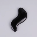 Professional black resin S-shaped massage tool with polished finish on a grey background - S-Shape