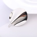 Detailed view of silver minimalist wavy metal hair clip with high-polish mirror finish - Silver - Wavy Disc